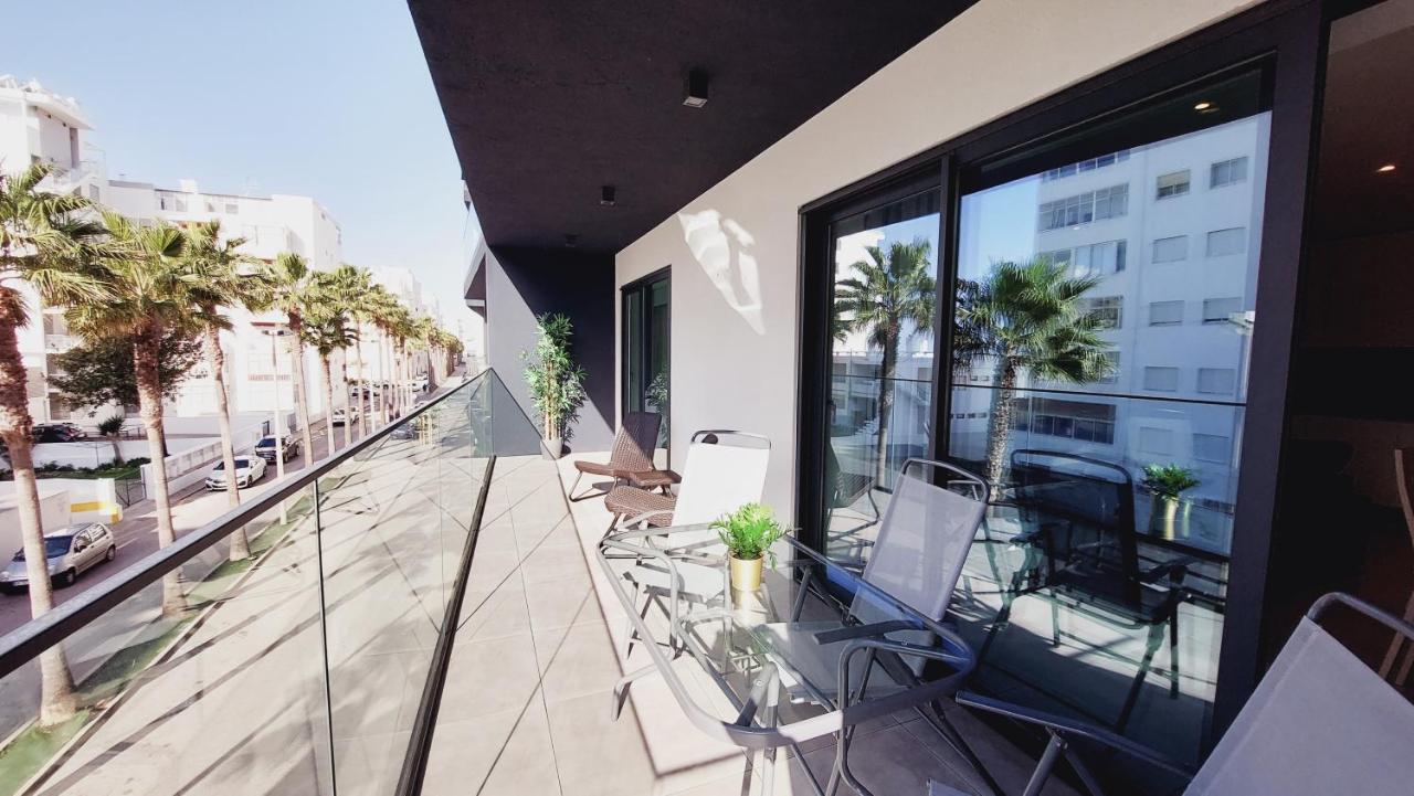 Apartamento Meerblick Quarteira Bagian luar foto